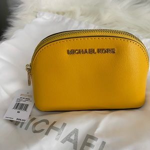 Michael Kors travel pouch.